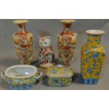 A collection of Chinese porcelain to include vases, tureens and a cat. H.40cm