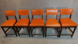 A set of five leather upholstered high chairs. H.103cm