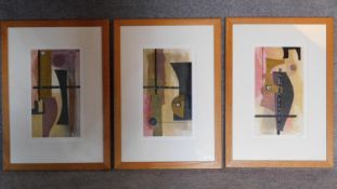 A set of three framed and glazed mixed media artworks, abstract paper and textile collages. Signed