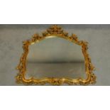 A carved wood gilt framed Florentine style overmantel mirror. 115x114cm
