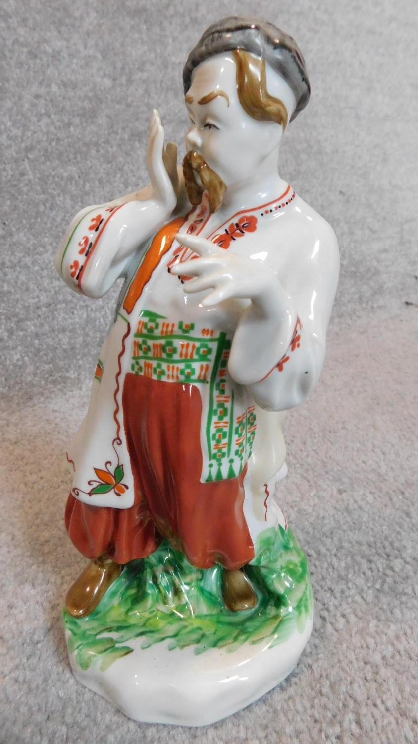 A pair of chinese figures and a pair of Russian similar. H.25cm - Image 5 of 7