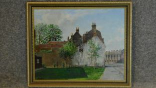 A framed oil on board, Cheshunt, a street scene, gallery label verso. 34x42cm