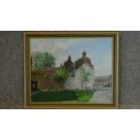 A framed oil on board, Cheshunt, a street scene, gallery label verso. 34x42cm