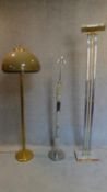 A collection of three various standing lamps. H.183cm