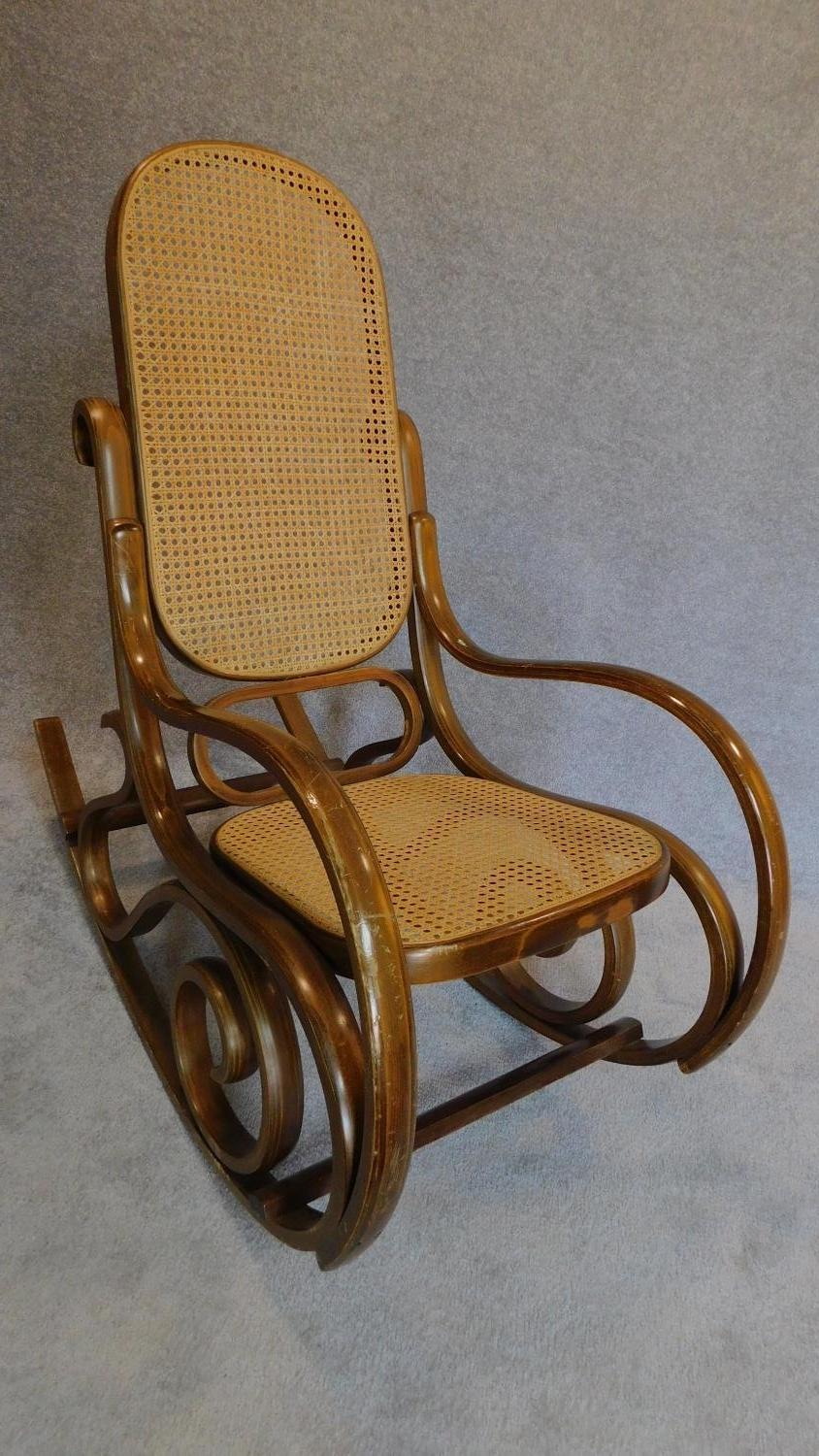A bentwood caned rocking chair. H.104 W.52 D.97cm