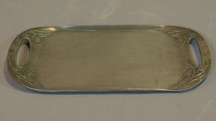 A Tudric for Liberty's Archibald Knox design twin handled pewter tray. 47x26cm