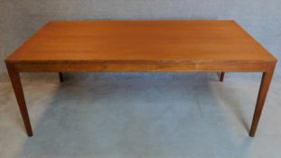 A 1960's Danish teak dining table designed by Finn Juhl for the France and Son Diplomat range.