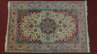 A fine weave silk Persian Isfahan rug. 165x107cm