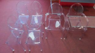 A set of 6 Philippe Starck ghost chairs by Kartell to include 2 elbow chairs. H.92cm