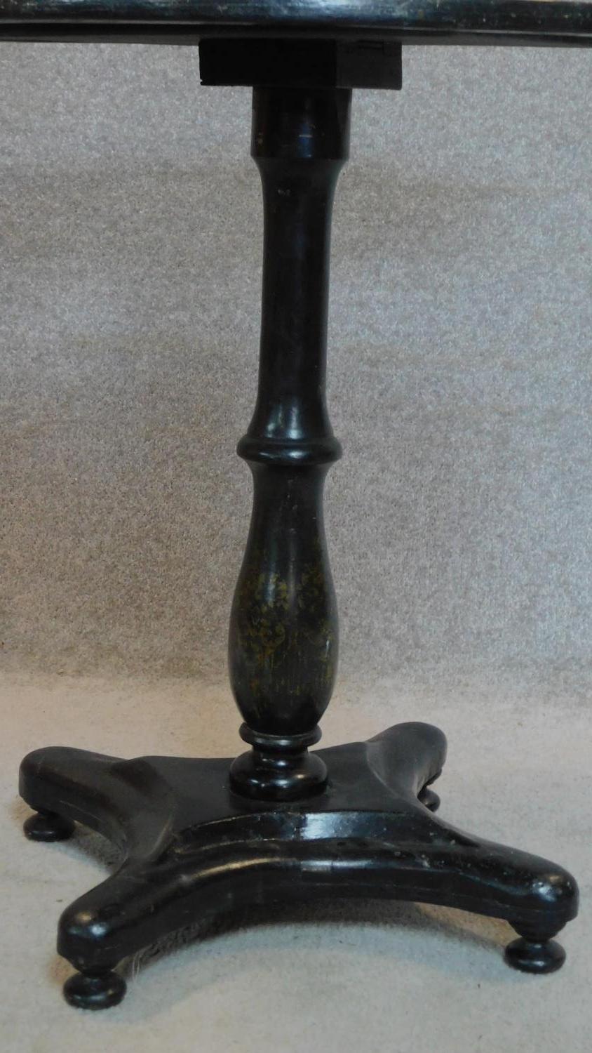 A Victorian ebonised painted and mother of pearl inlaid circular occasional table. 70x61x61cm - Image 3 of 4