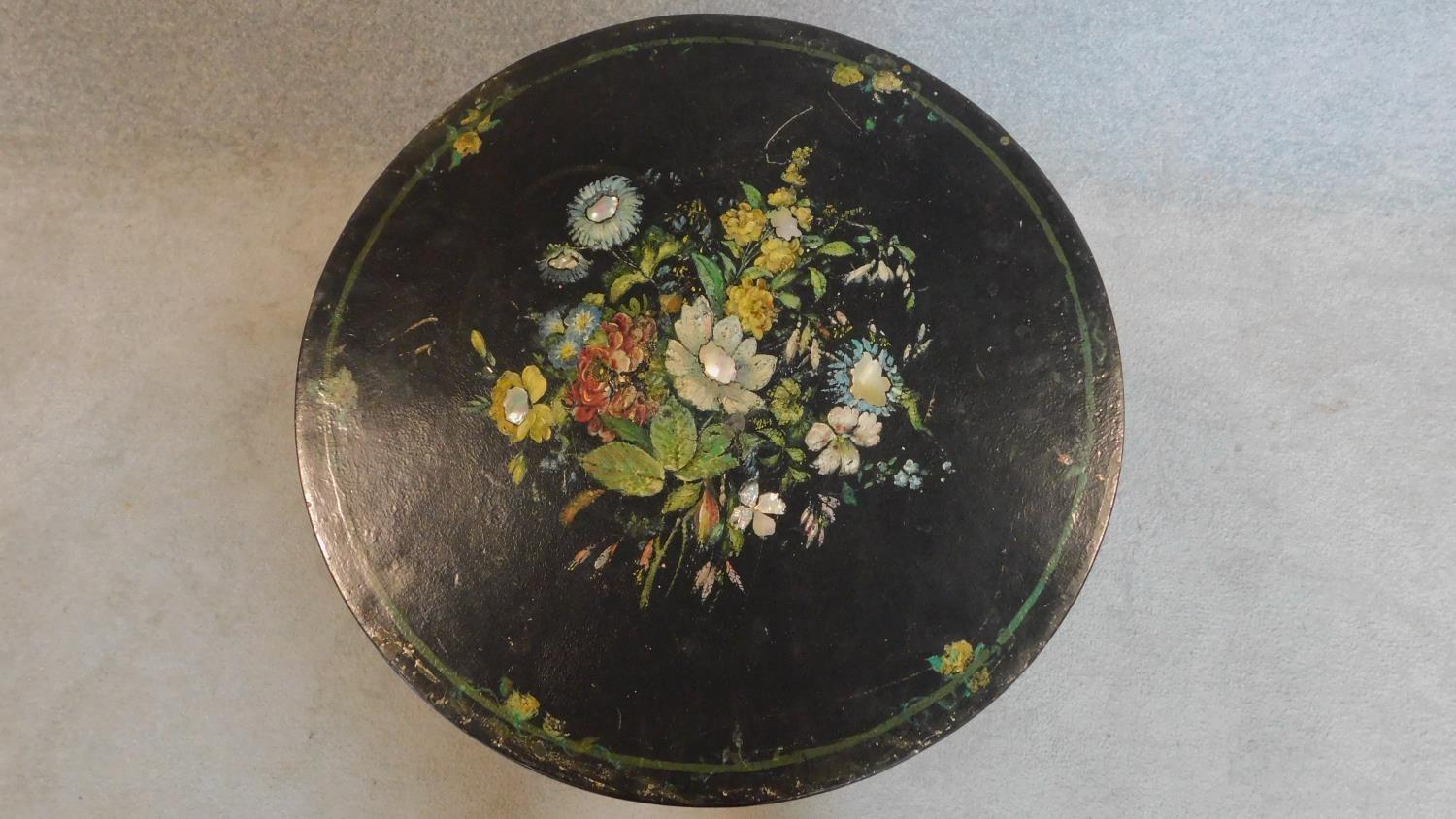 A Victorian ebonised painted and mother of pearl inlaid circular occasional table. 70x61x61cm - Image 2 of 4