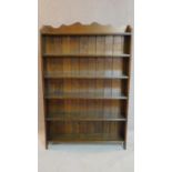 A mid 20th century oak open bookcase. 140x91cm