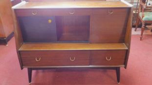 A vintage teak E. Gomme G-Plan fitted side cabinet. 97x122x48cm