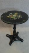 A Victorian ebonised painted and mother of pearl inlaid circular occasional table. 70x61x61cm