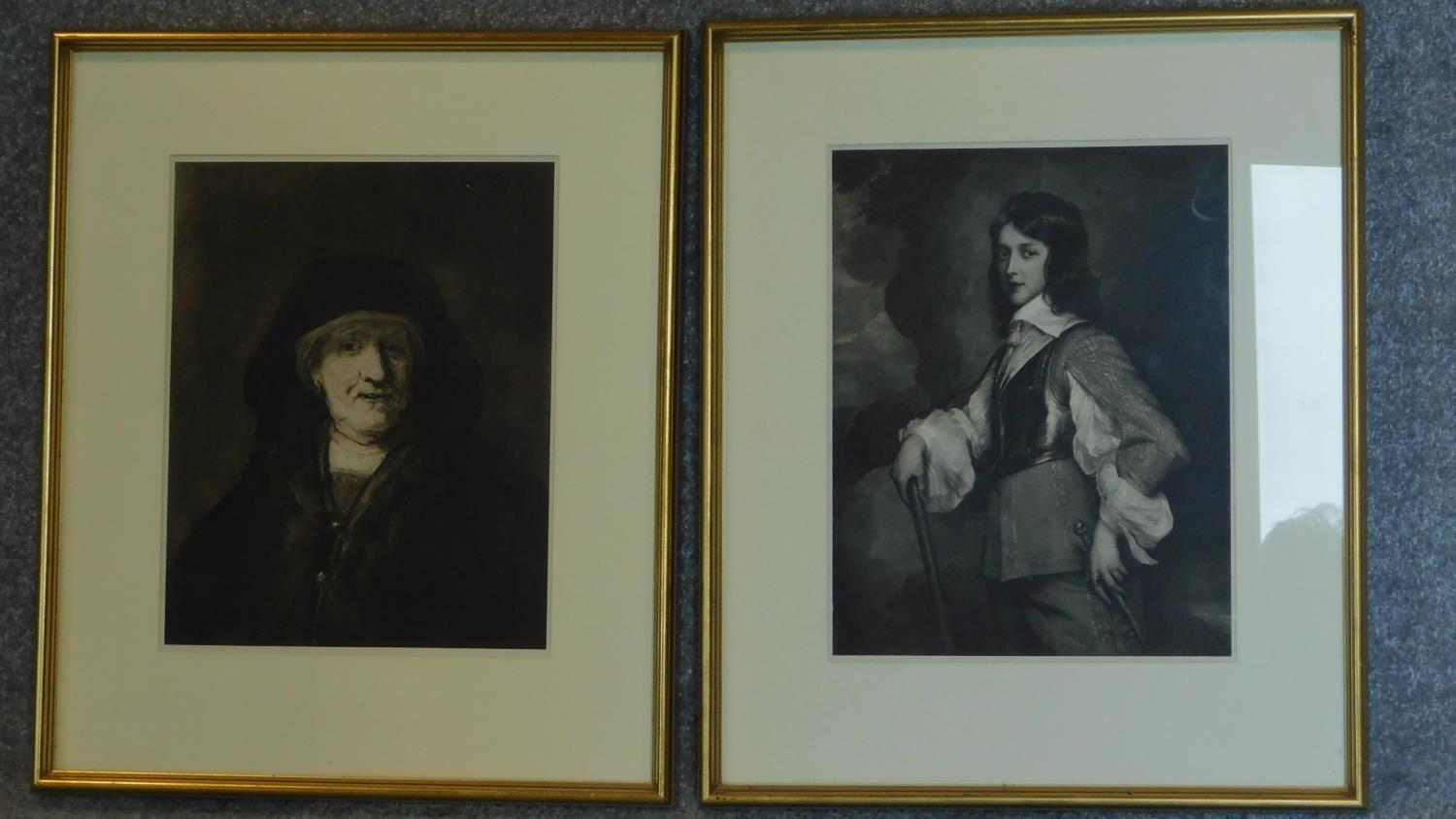 A pair of framed and glazed monochrome prints, Van Dyke, Rembrandt portraits. 54x44cm