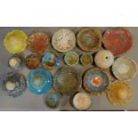 A large and miscellaneous collection of multi coloured glazed Art pottery bowls and dishes.