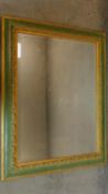 A late 19th century gilt and green painted rectangular wall mirror. 95x75cm