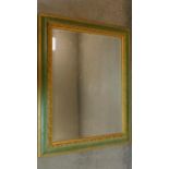 A late 19th century gilt and green painted rectangular wall mirror. 95x75cm