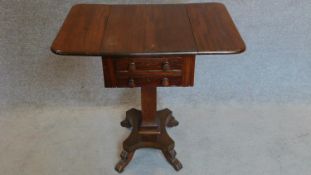 A 19th century mahogany drop flap work table fitted frieze drawers. 69x71x49cm