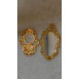 A carved giltwood Florentine style wall mirror and a smaller similar. 82x47cm (Largest)