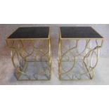 A pair of gilt metal framed low tables with glass tops. 50x38cm