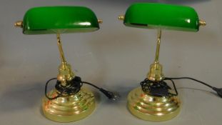 A pair of banker's desk lamps with green glass shades. H.36cm
