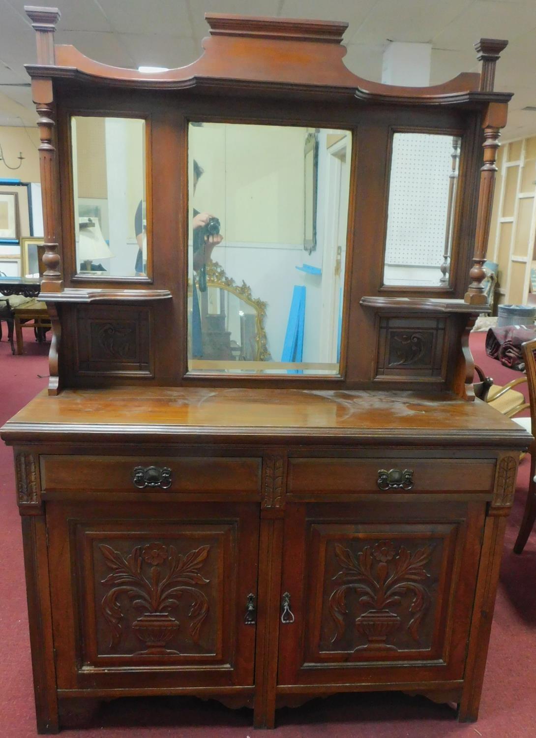 A late 19th century carved walnut mirror backed sideboard. 195x135x47cm