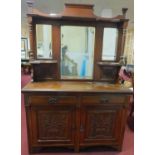 A late 19th century carved walnut mirror backed sideboard. 195x135x47cm