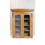 A late Victorian mahogany bookcase section with twin glazed doors. 122x98cm (One pane detached but