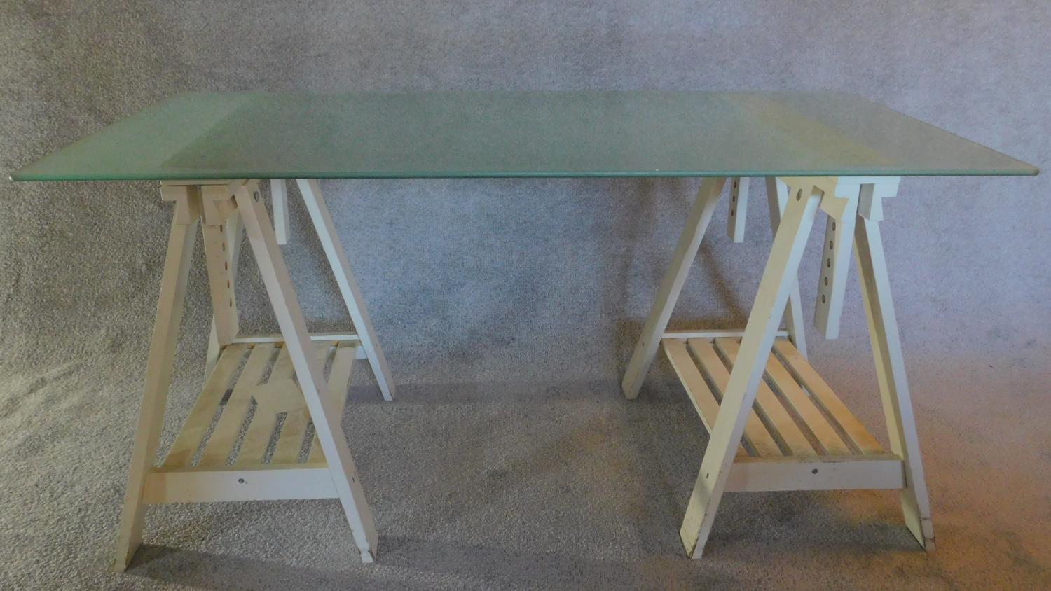 A plate glass topped dining table with painted trestle style supports. H.75 W.150 D.80cm - Image 2 of 2