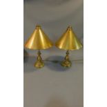A pair of brass desk lamps with metal shades. H.58cm. (both shades detached, one bolt present but