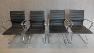 A set of four tubular chrome framed boardroom chairs. H.88cm