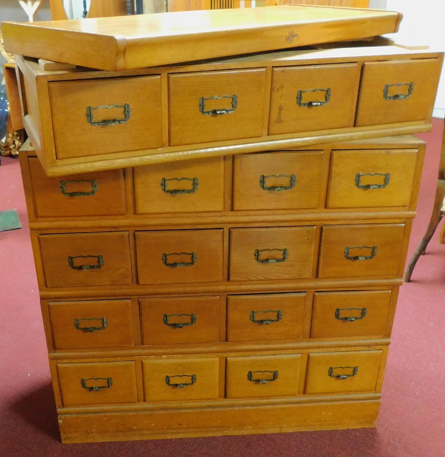 An American oak seven section (including plinth base and top) filing cabinet by Kenrick and - Image 10 of 10