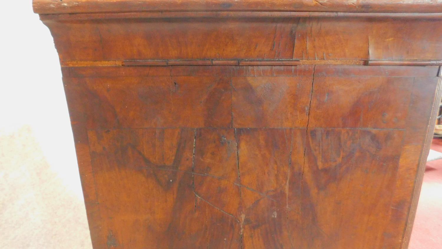 A mid Georgian walnut and featherbanded chest of three short over three long drawers. - Image 7 of 8
