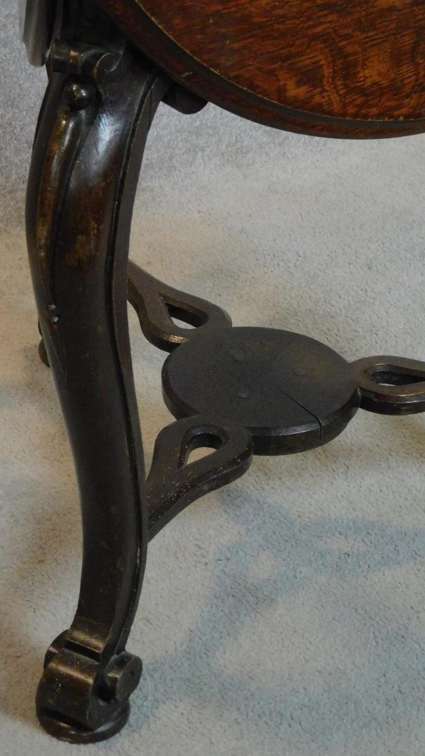 A 19th century Continental carved oak swivel action trefoil flap centre table. 74x82x82cm - Image 5 of 7