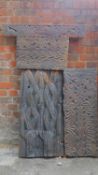 A collection of four antique carved panels from the Kafiristan region of Afghanistan. 84x44cm (