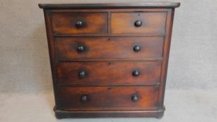 A Victorian mahogany chest of two short over three long drawers. 112x115x54cm
