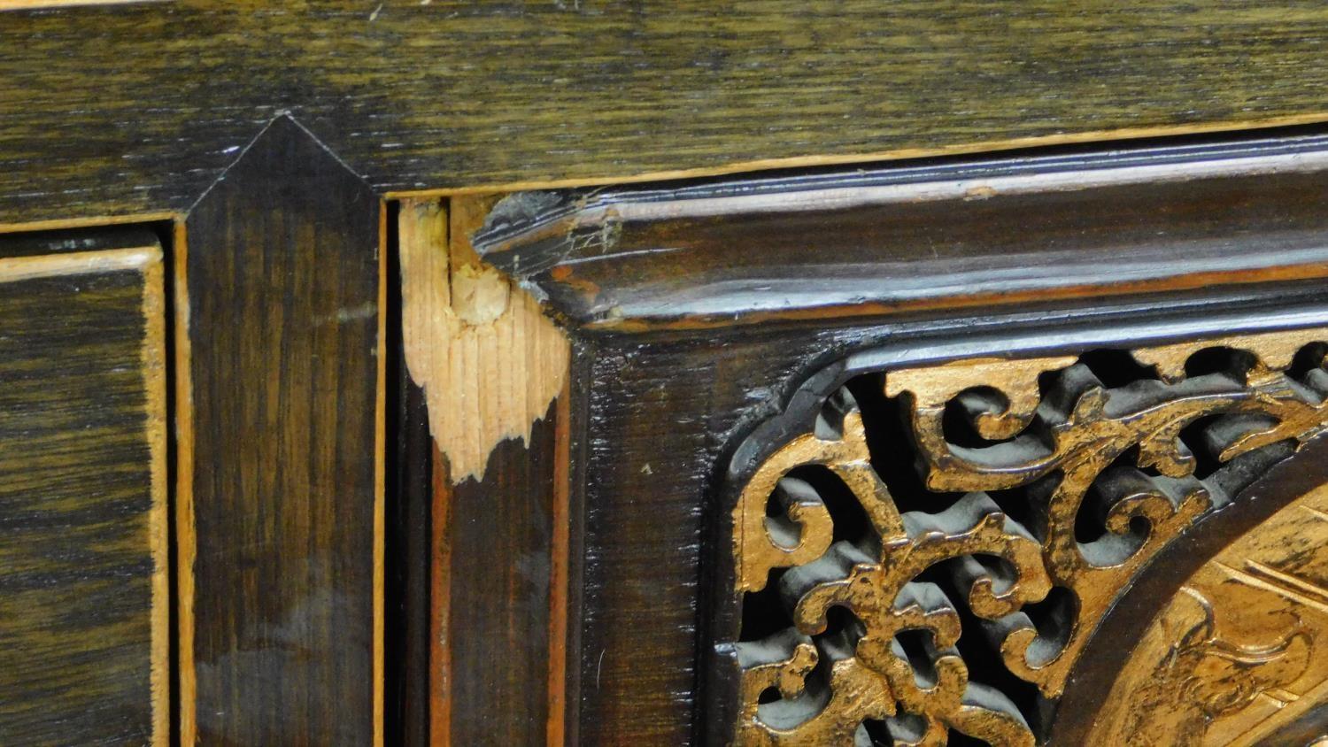 A lacquered and carved Chinese sideboard fitted central cupboard flanked by drawers. 90x180x45cm - Image 7 of 10