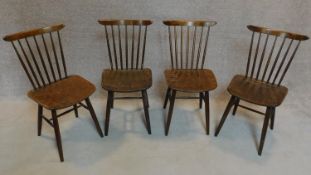 A set of four vintage stick back dining chairs. H.82cm
