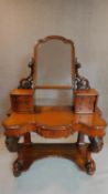 A mid Victorian mahogany Duchess style dressing table. 171x124x54cm