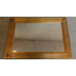 A reeded gilt framed rectangular mirror with bevelled plate. 94x69cm