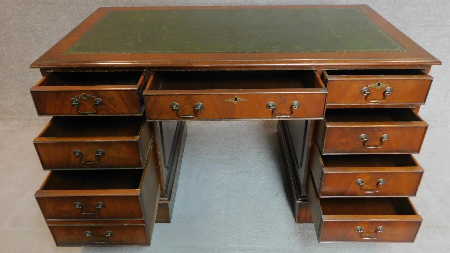 A Georgian style mahogany three section pedestal desk with tooled green leather inset top. - Image 3 of 6