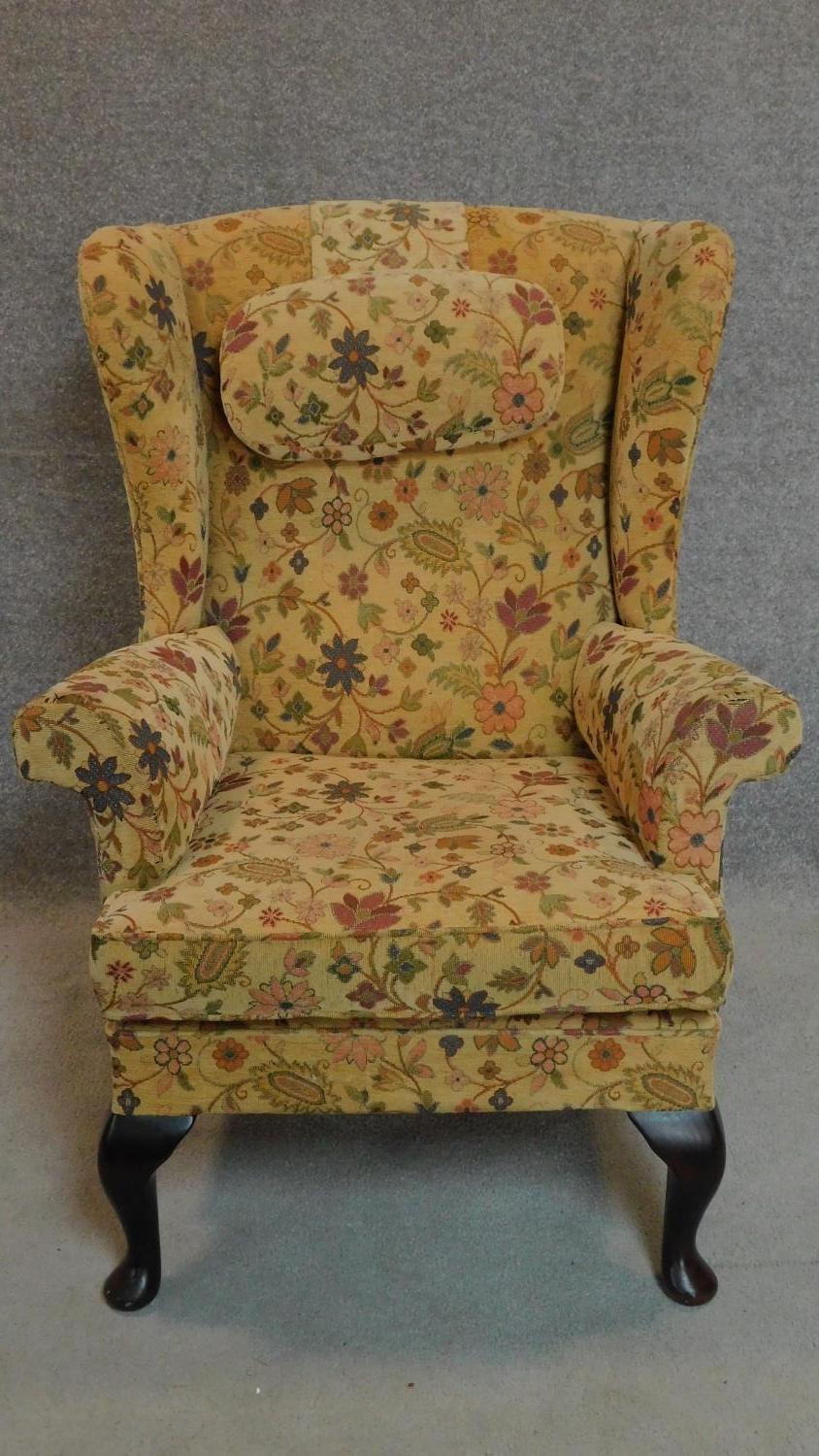 A Georgian style Parker Knoll wingback armchair in floral tapestry upholstery. H.96cm - Image 2 of 8