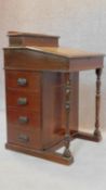 A Edwardian mahogany and inlaid davenport fitted four drawers. 81x53x53cm