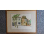 A framed contemporary watercolour, depicting a church in the suburbs of a city, signed. 36x46cm