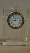 A Waterford crystal mantel clock. 11x8cm