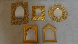 A miscellaneous collection of five small gilt carved or moulded mirrors. 45x31cm