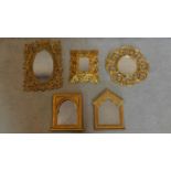 A miscellaneous collection of five small gilt carved or moulded mirrors. 45x31cm