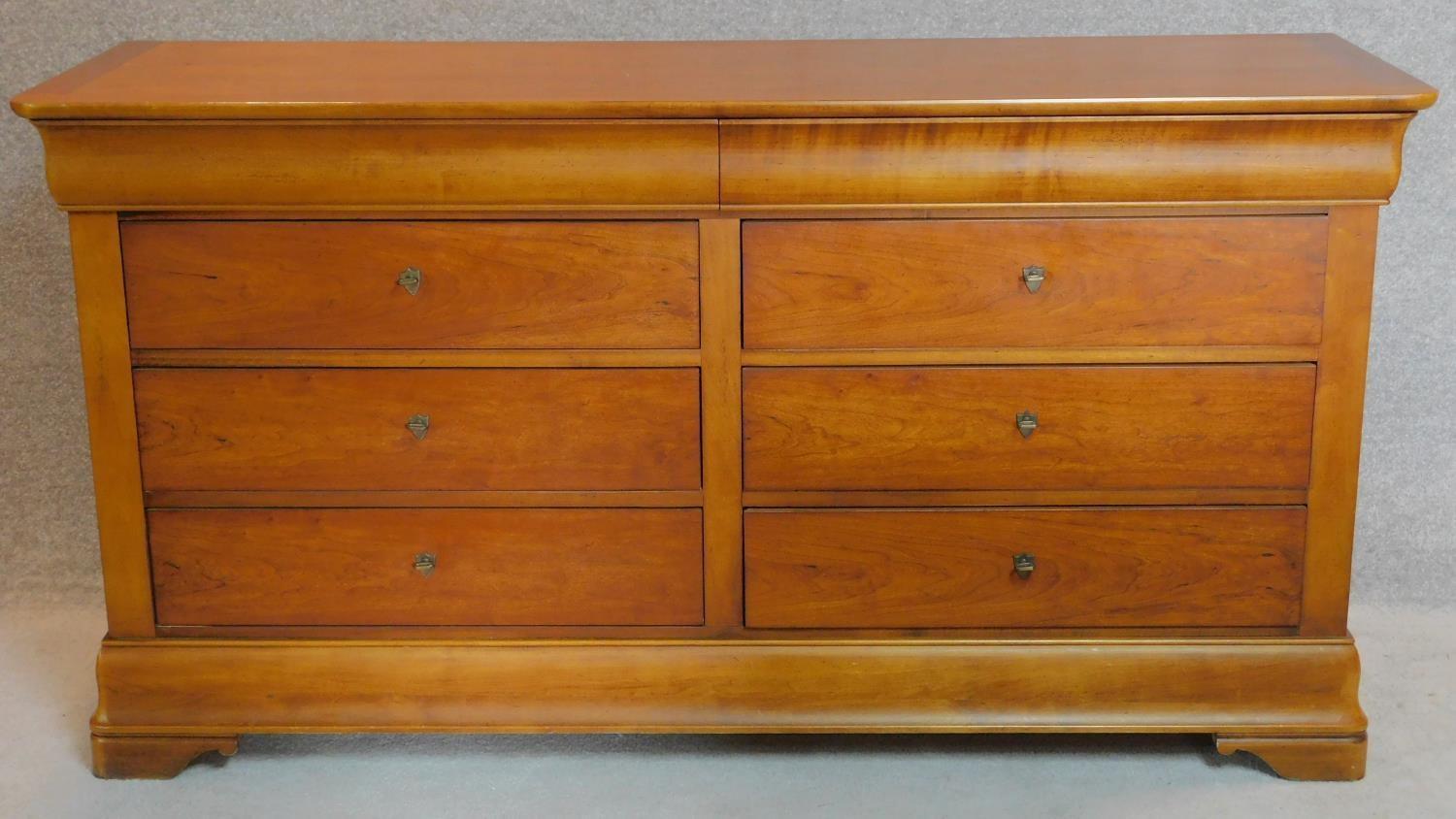 A French provincial style walnut six drawer sideboard. H.91 L.171cm
