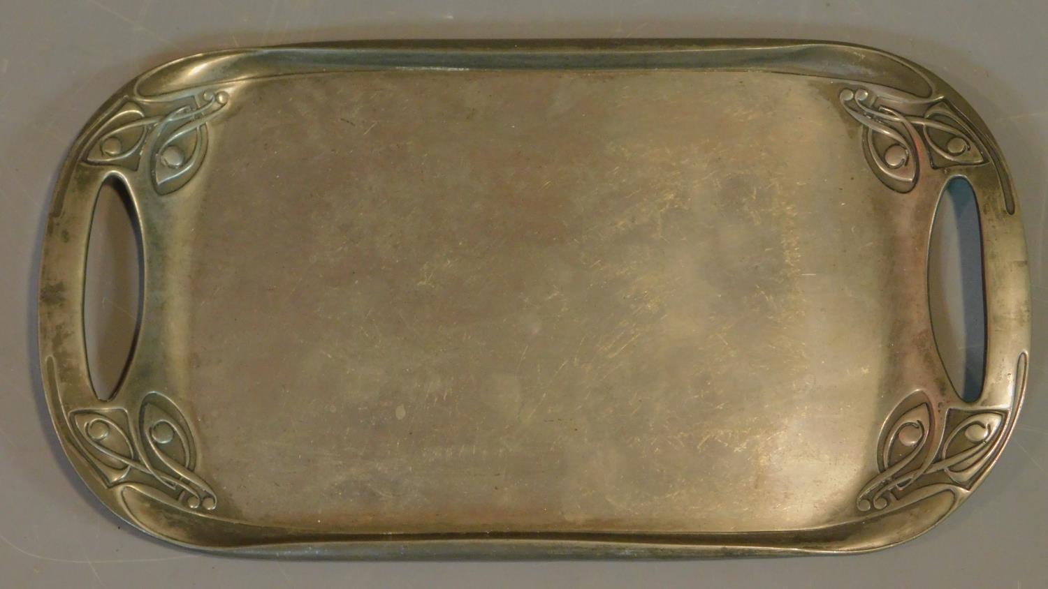 A Tudric for Liberty's Archibald Knox design twin handled pewter tray. 47x26cm - Image 2 of 4